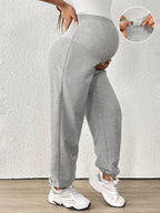 Detailed View of Stretchy Over-the-Belly Support Panel on Maternity Cropped Pants - Seamless Comfort for Growing Bump - Fanghuang